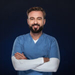 Home portrait of a smiling male doctor