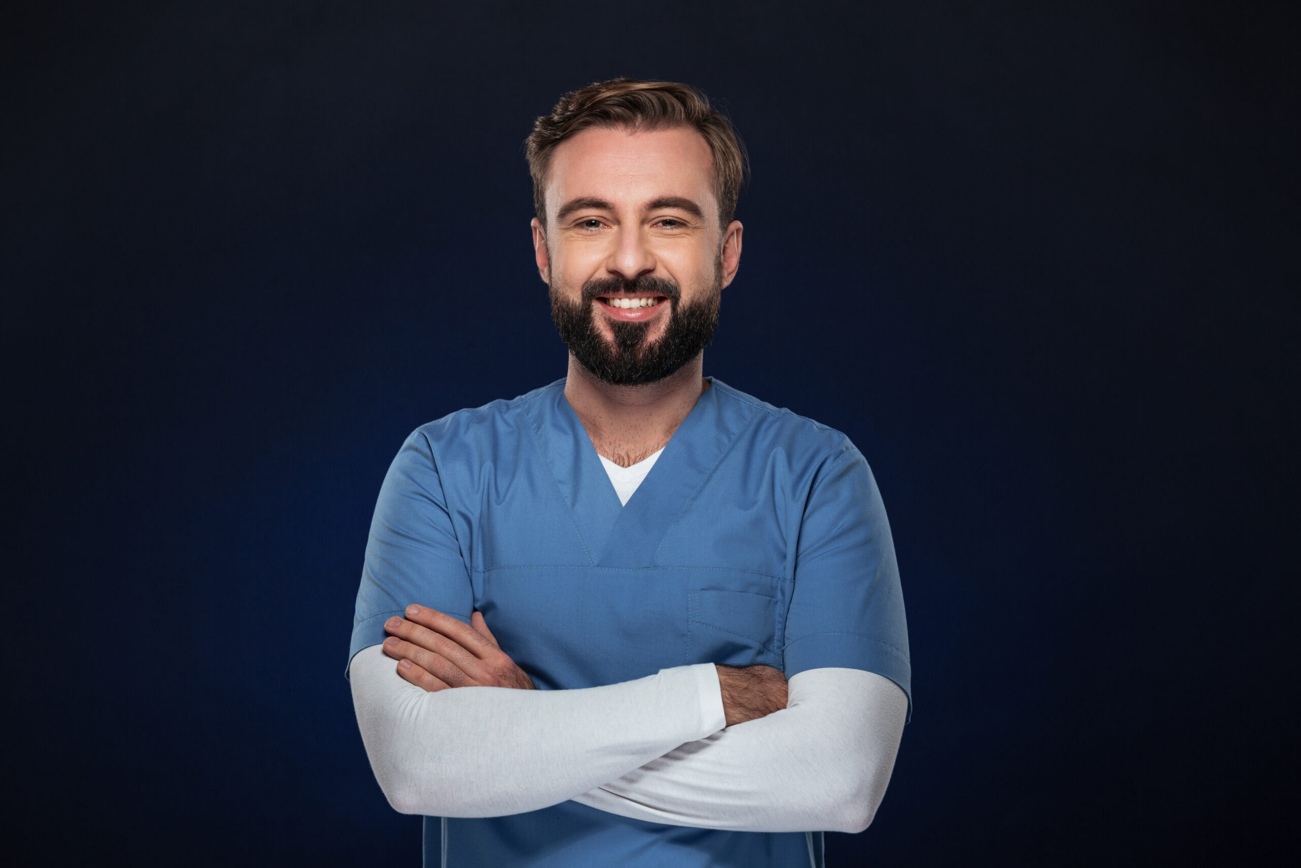portrait of a smiling male doctor